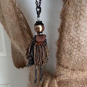 Vintage Bronze and Black Doll Pendant Necklace